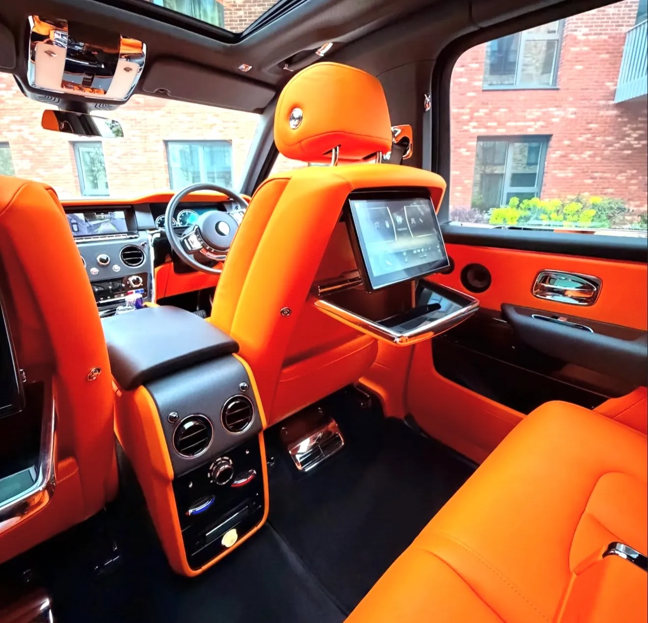 Black executive coach on a city street