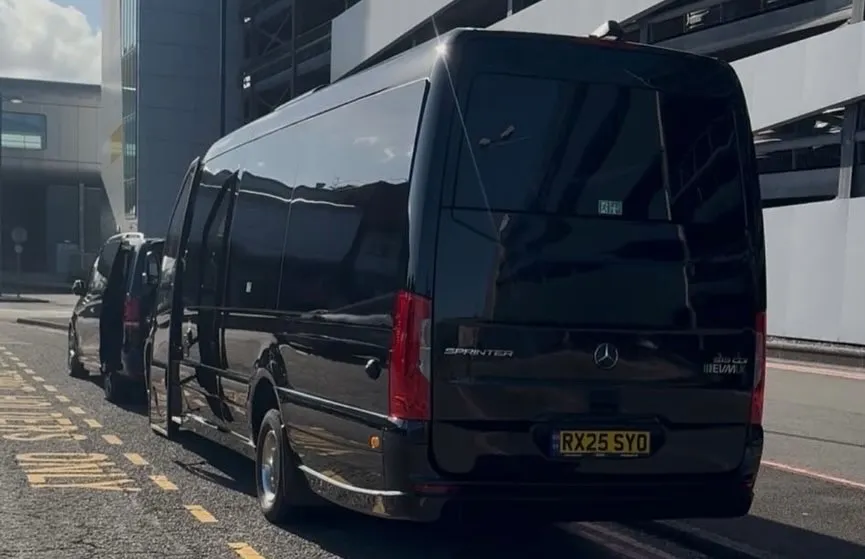 Luxury coach interior with leather seating and ambient lighting