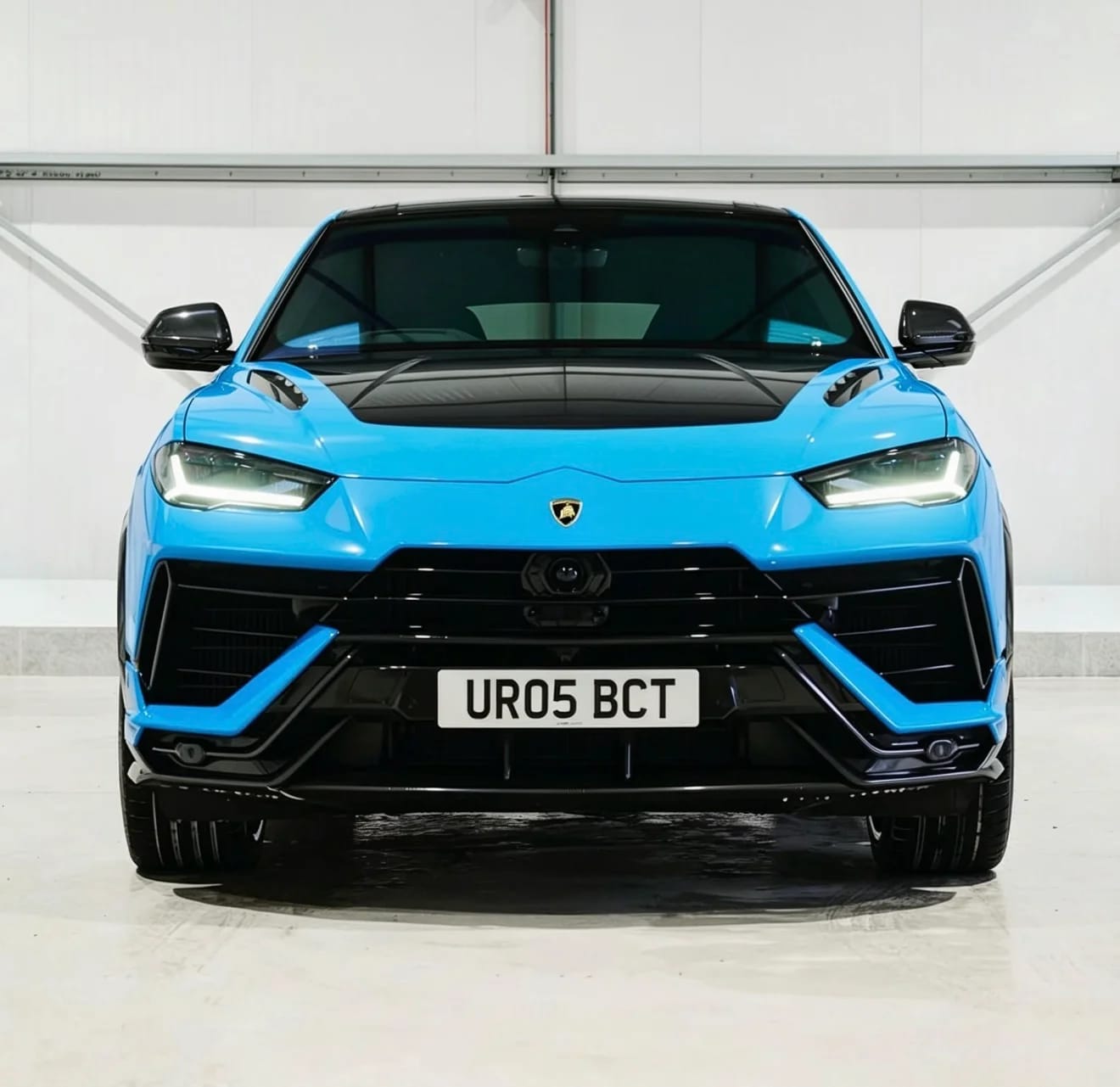 Light blue Lamborghini Urus luxury SUV — chauffeur hire UK